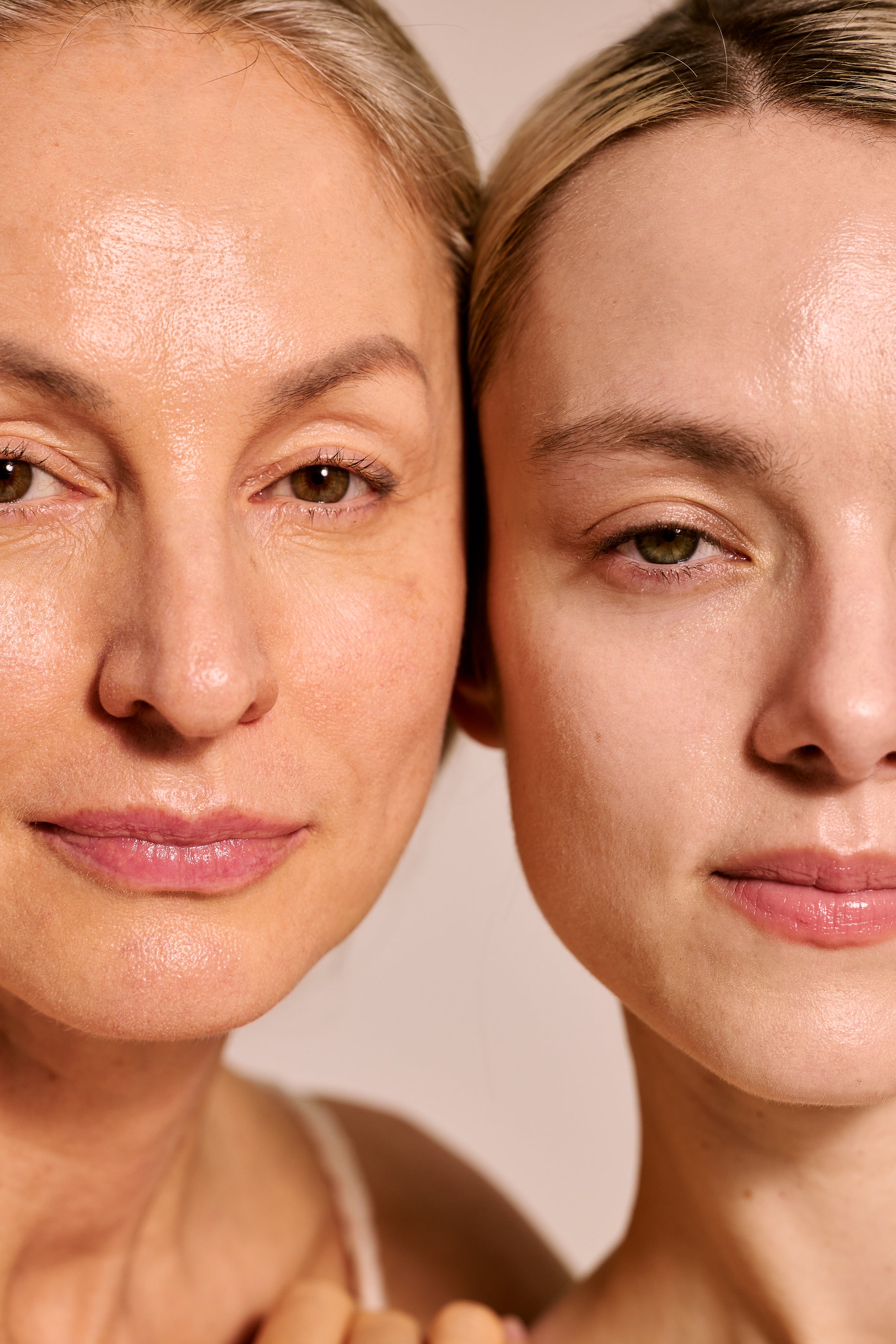 Women treating their skin with red light therapy for radiant results