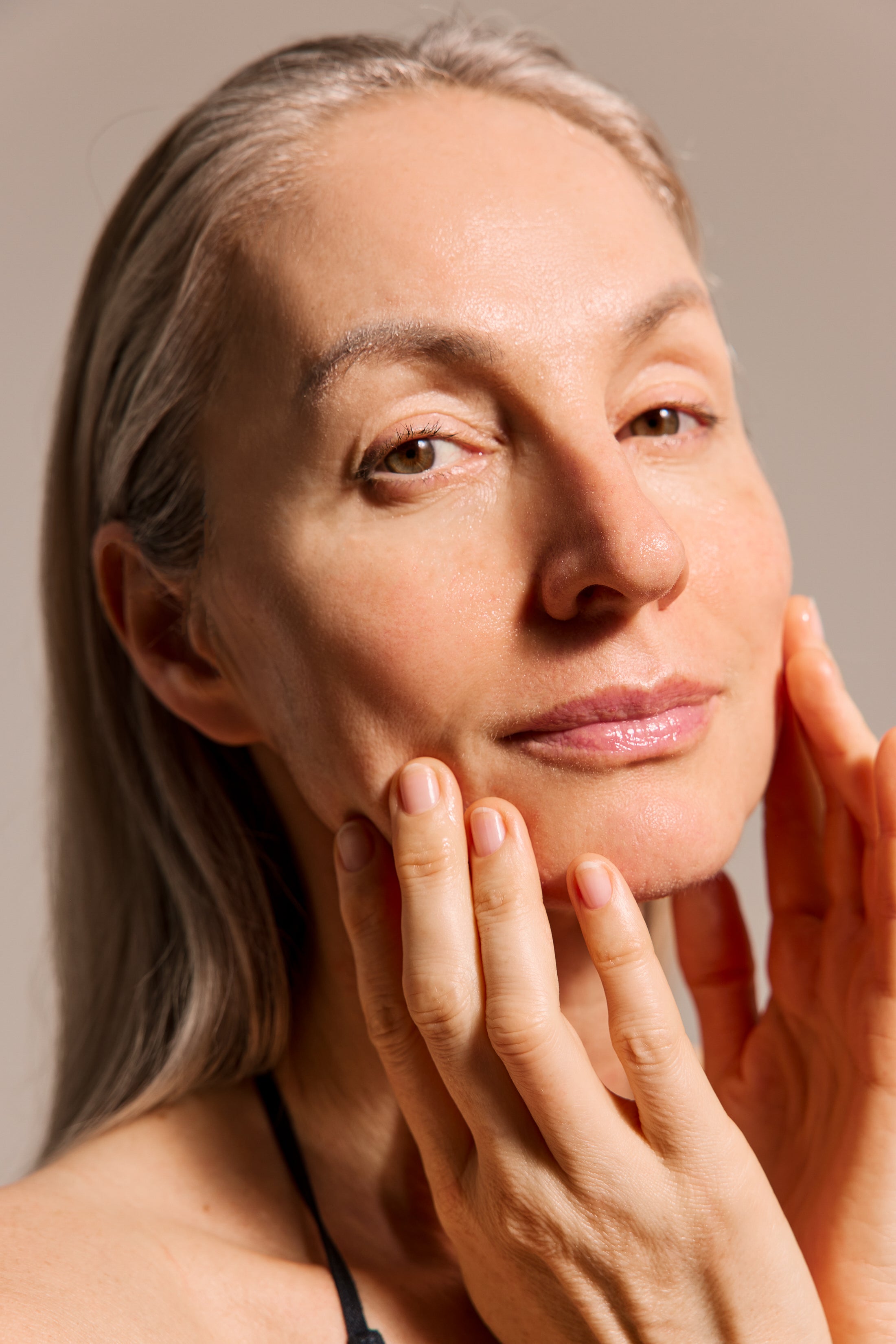 Red light therapy session with women in a home spa setting